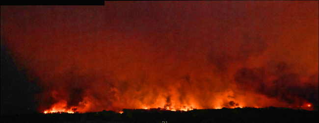 Waldo Canyon Fire flames inside Colorado Springs northwest neighborhoods, evening 26 June 2012.